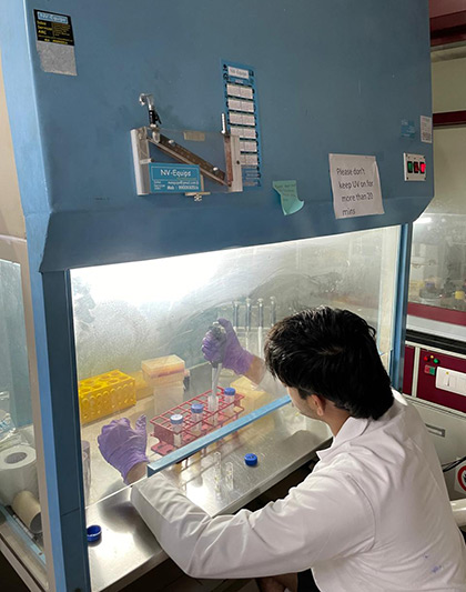 Hridank Goradia preparing experimental materials for his biology research project at RSI-India 2025
