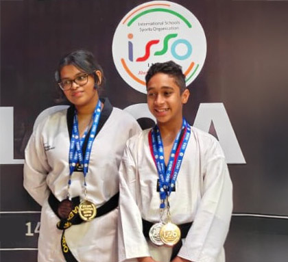 Aaliya Sen Gupta of Class 10B holding her Gold and bronze medal at the ISSO National Taekwondo Tournament