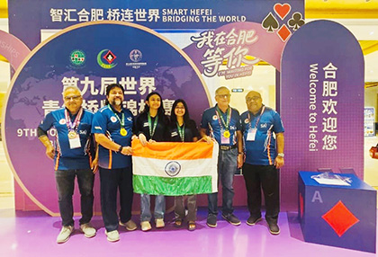 Viha and Ananya with India coaches