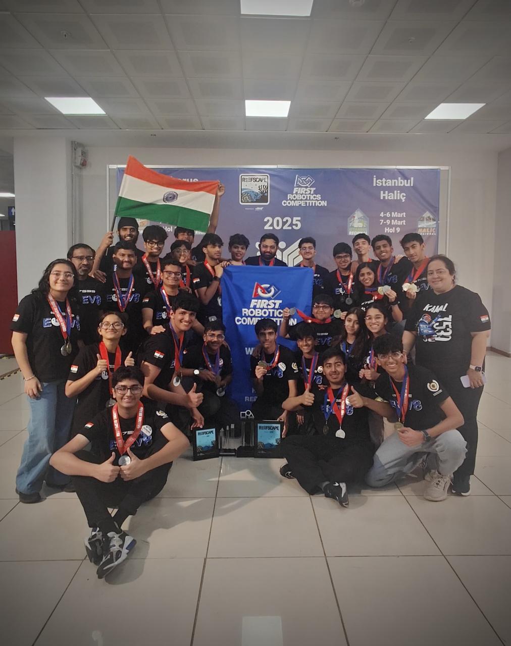 FIRST Robotics Competition — Team Elev8 with robot